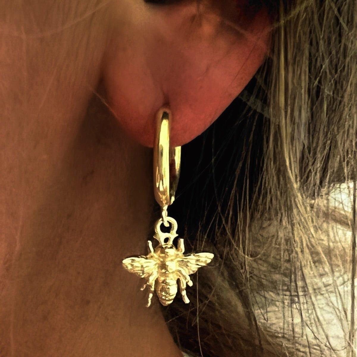 Gold bee sales hoop earrings