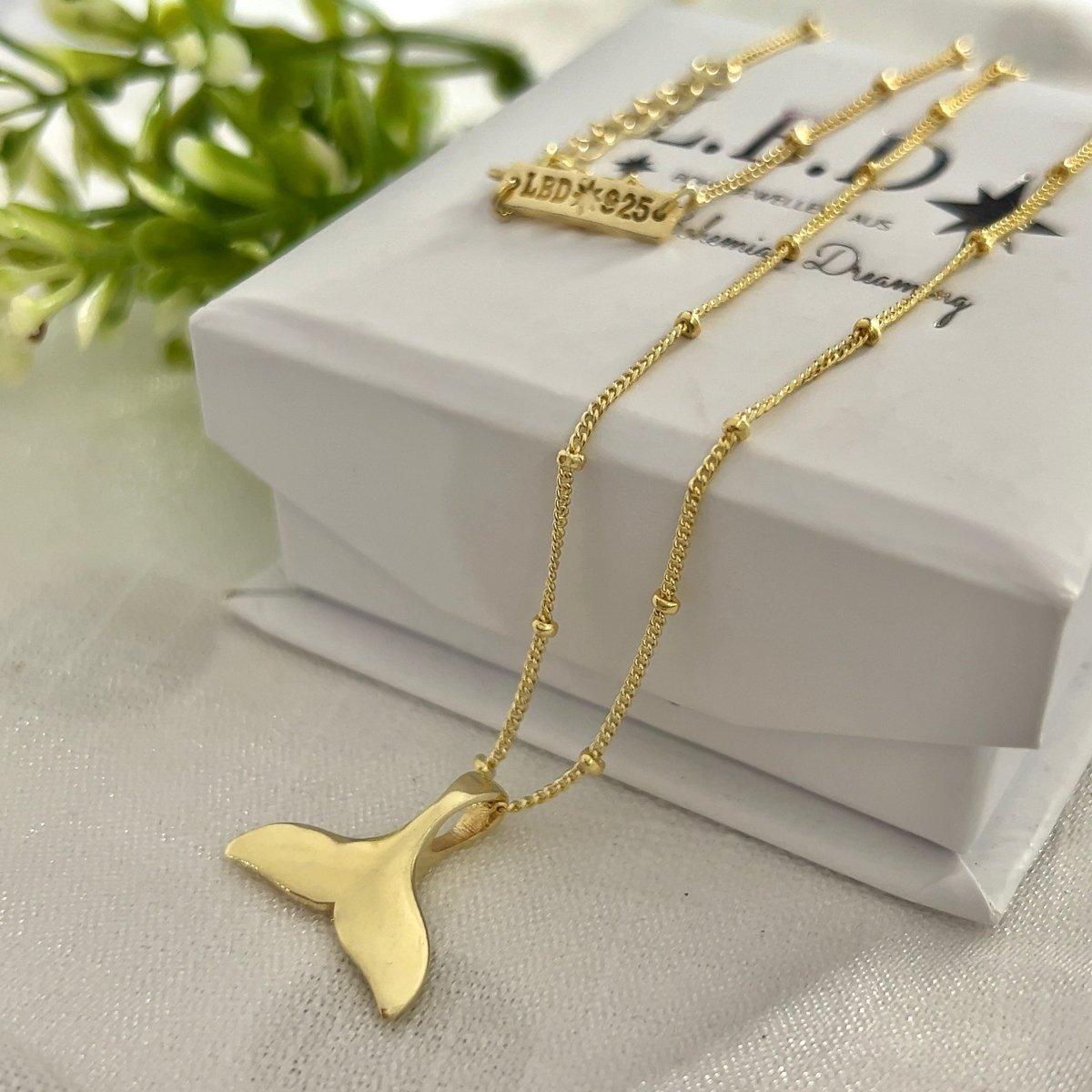 Gold whale tail necklace - delicate dainty black cord necklace with a gold  whale fin pendant. surfer necklace, gift for her, nautical – Shani & Adi  Jewelry