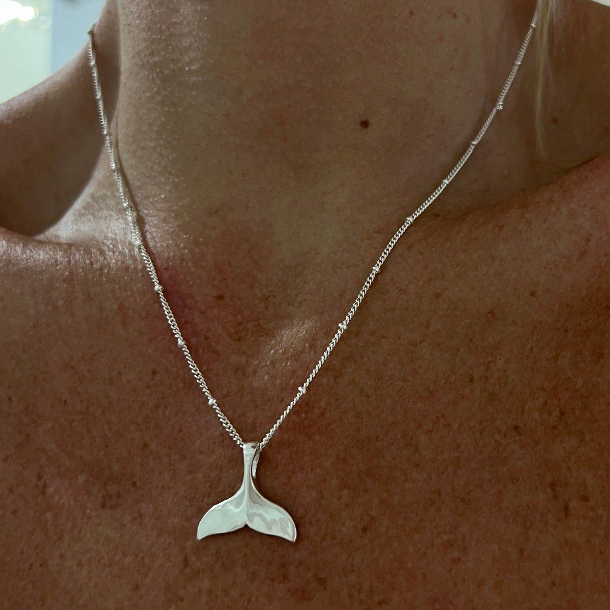 Whale shop fin necklace